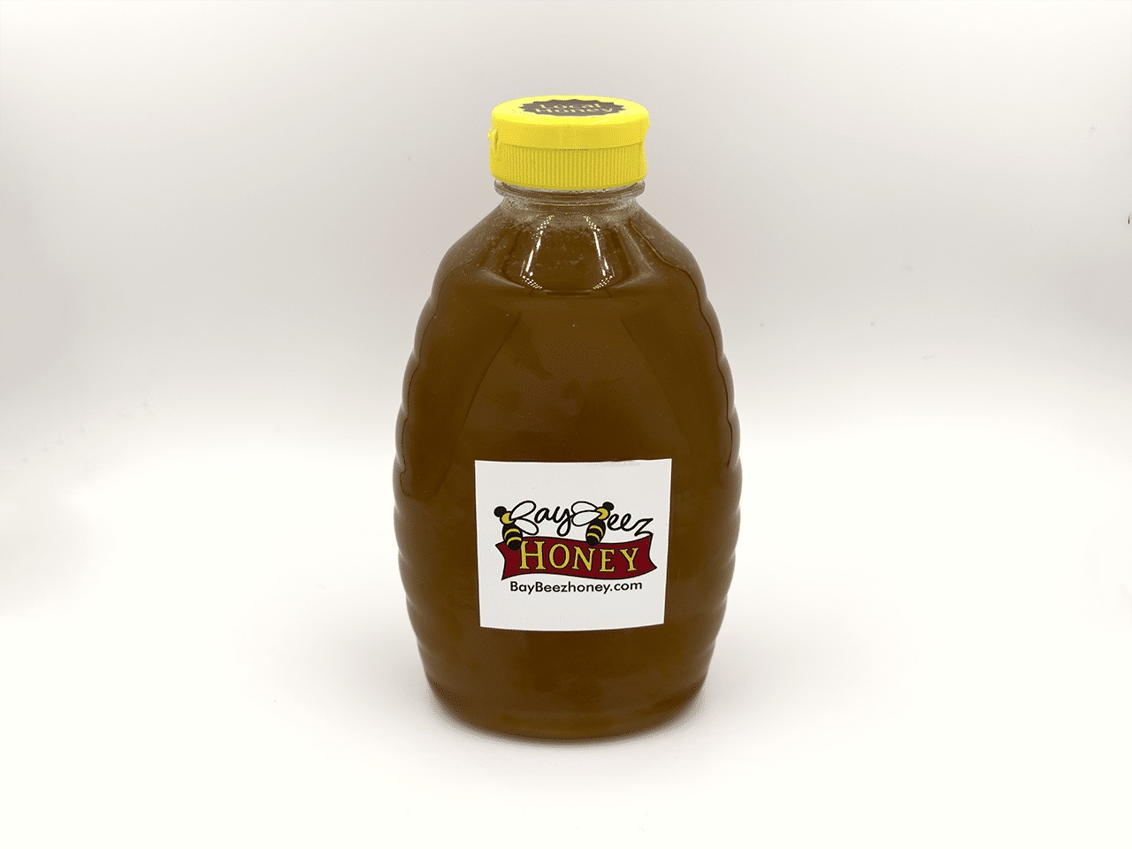 Bay Beez raw honey in a squeezable jar